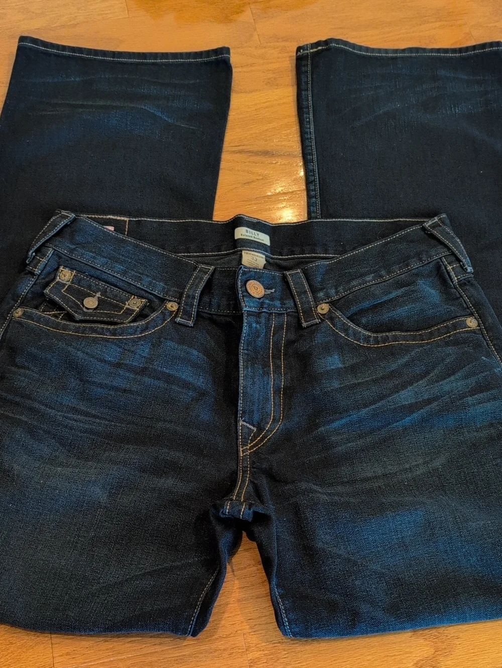 True Religion men's Dark Blue Bootcut Jeans with Signature Pocket Flap
